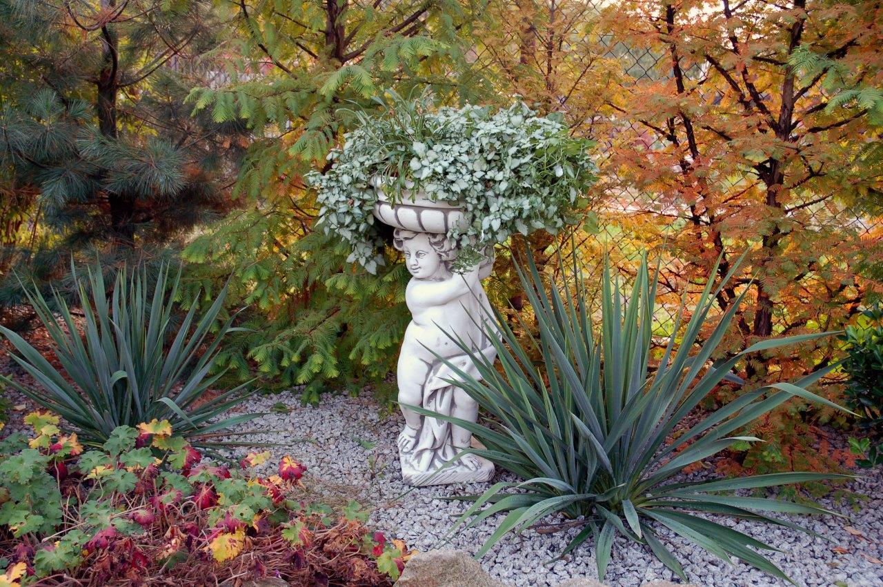 Classic Elegance: Grecian Boy Holding Basin Pot