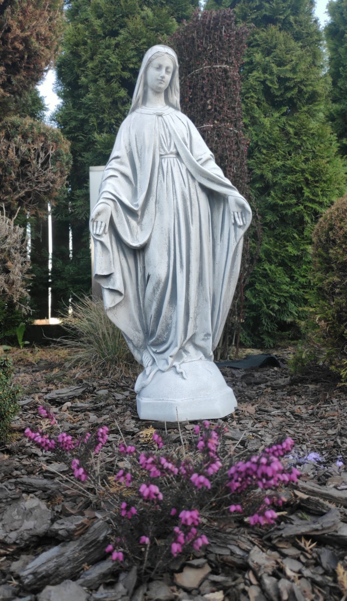Figure of Virgin Mary, outdoor or indoor sculpture made of reconstituted stone, religious statue