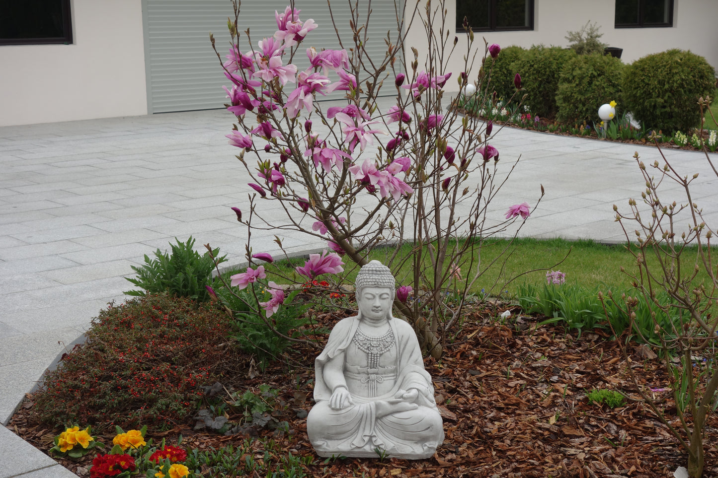 Tranquil Serenity: Seated Buddha Statue with Intricate Carvings