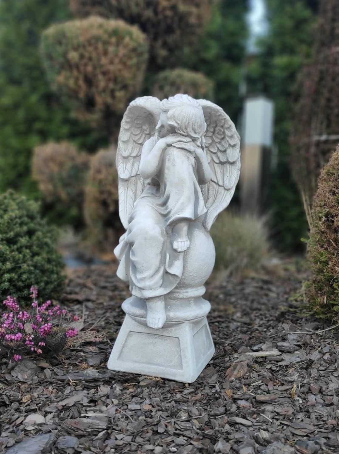 Sculpture of resting angel on pedestal 42cm
