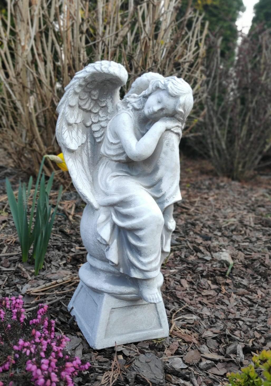 Sculpture of resting angel on pedestal 42cm