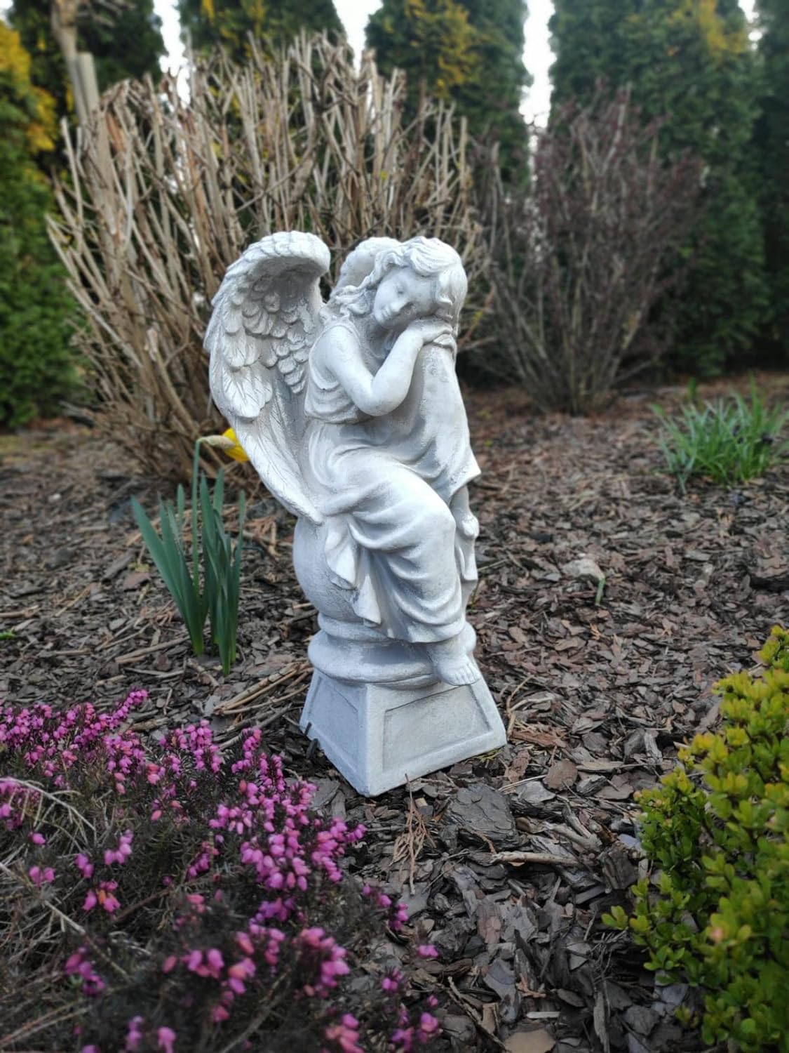 Sculpture of resting angel on pedestal 42cm