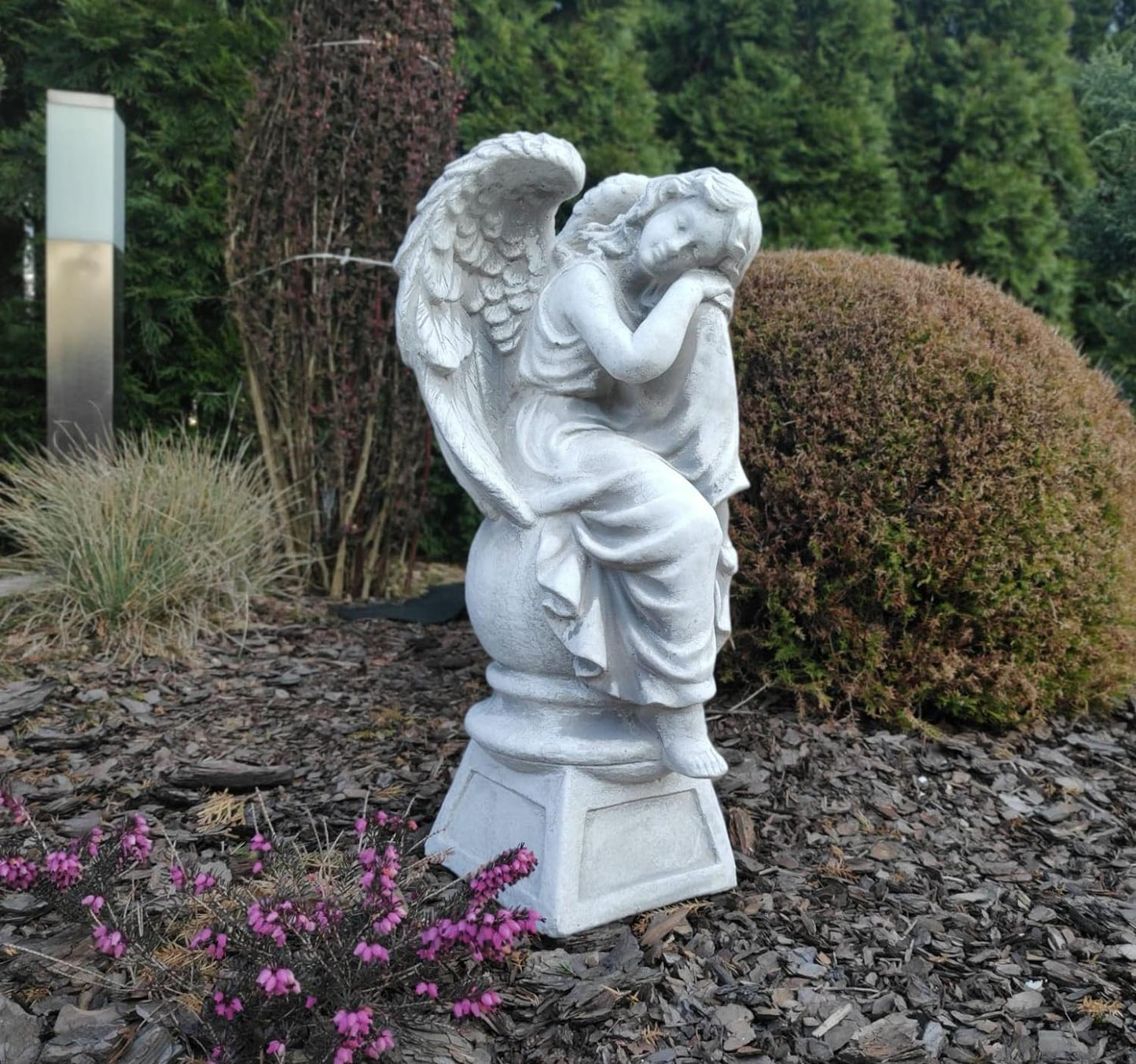 Sculpture of resting angel on pedestal 42cm