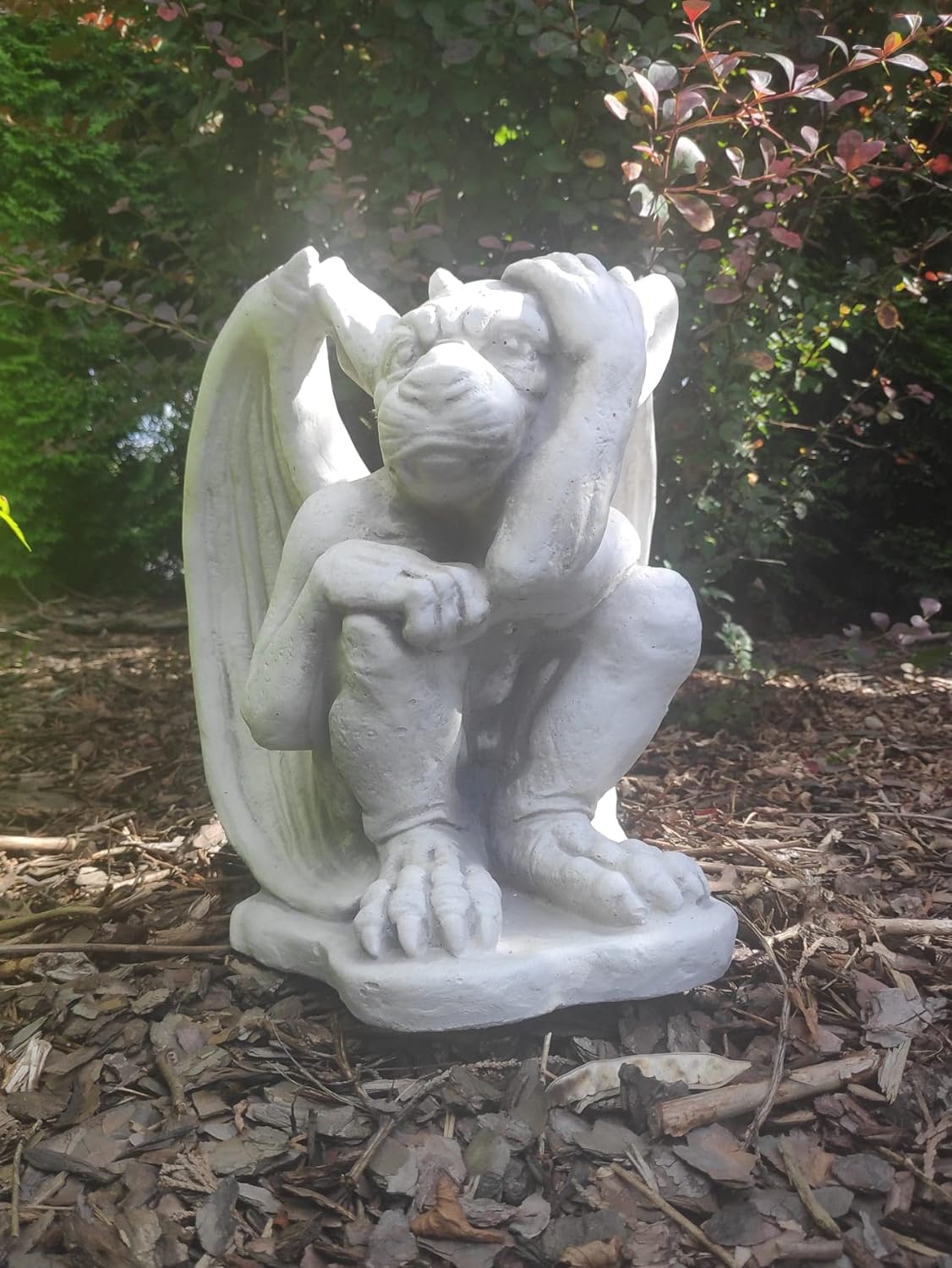 Small figurine of gargoyle, outdoor or indoor ornament, stone statue