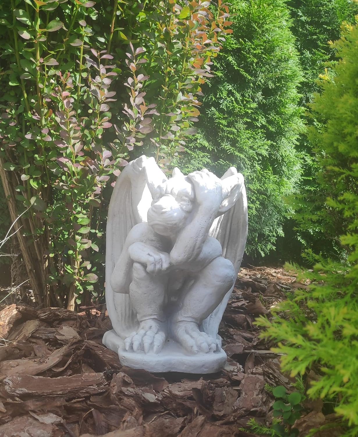 Small figurine of gargoyle, outdoor or indoor ornament, stone statue