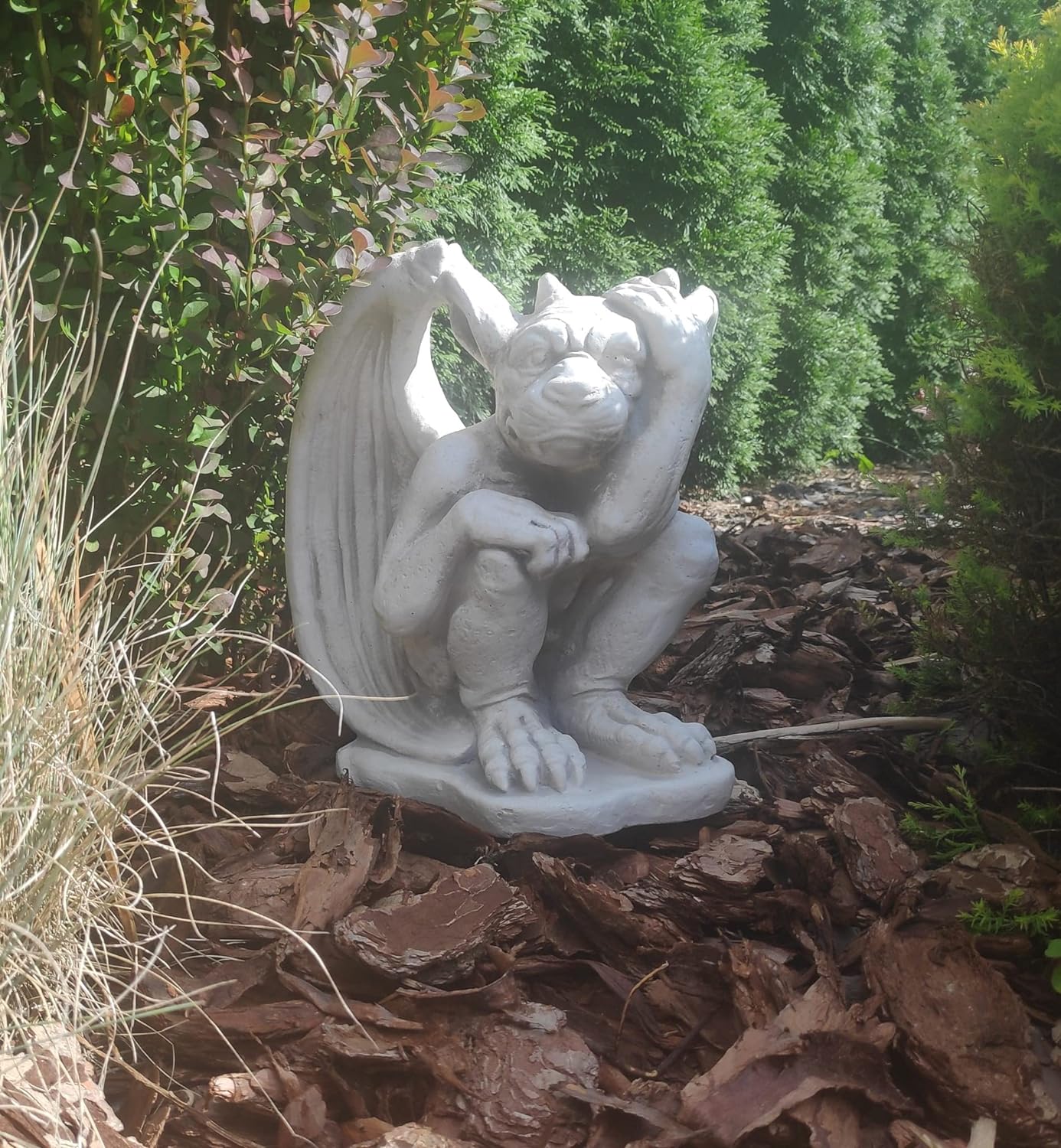 Small figurine of gargoyle, outdoor or indoor ornament, stone statue